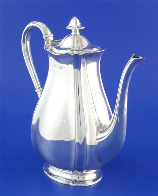 A late Victorian silver coffee pot, gross 21.5 oz.